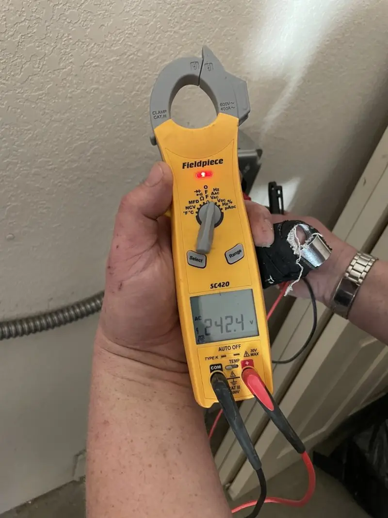 Voltage testing with clamp meter during Generator Installation in Porter
